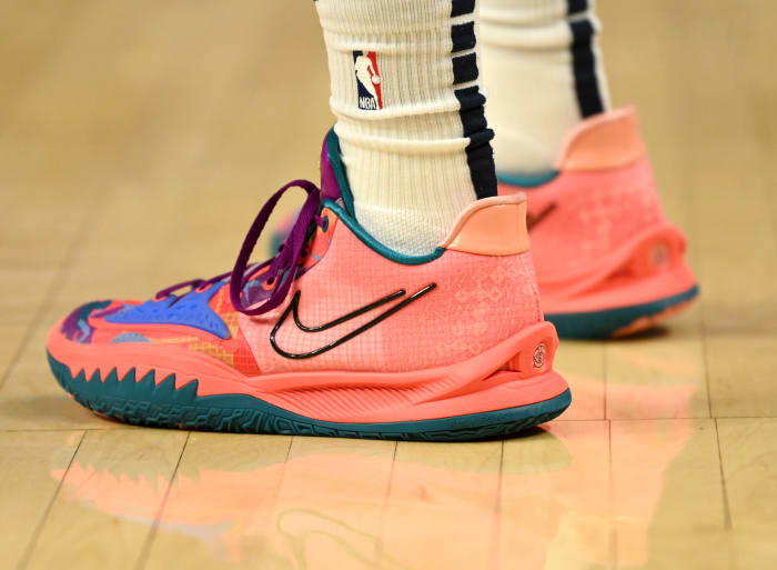 Ja Morant wearing the Nike Kyrie Low 4 '1 World 1 People'.